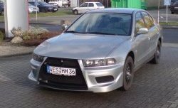 11 099 р. Передний бампер Evo style Mitsubishi Galant 8  дорестайлинг седан (1996-1998) (Без сетки, Неокрашенный)  с доставкой в г. Кемерово. Увеличить фотографию 3