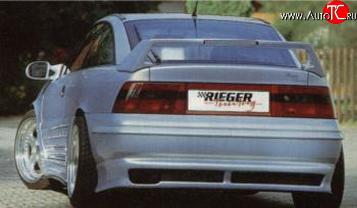 4 499 р. Накладка заднего бампера Rieger Opel Calibra A (1990-1997)  с доставкой в г. Кемерово