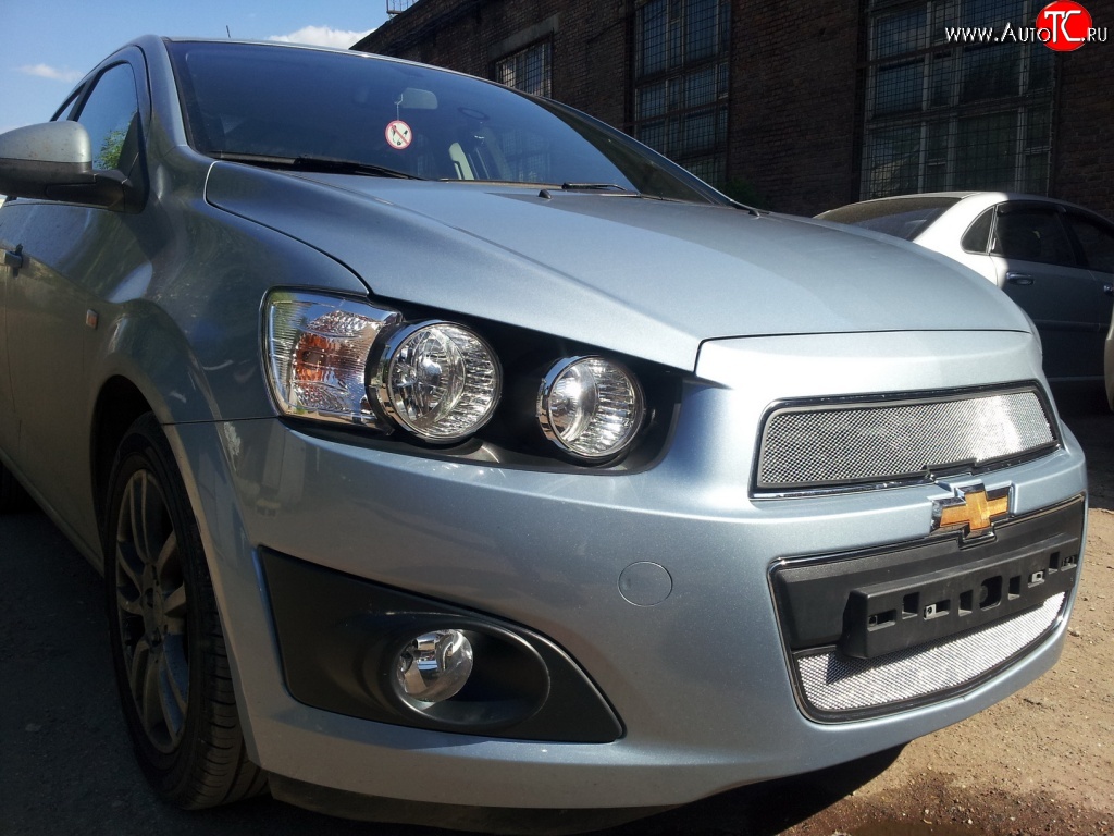 1 539 р. Нижняя сетка на бампер Russtal (хром)  Chevrolet Aveo  T300 (2011-2015) седан, хэтчбек  с доставкой в г. Кемерово