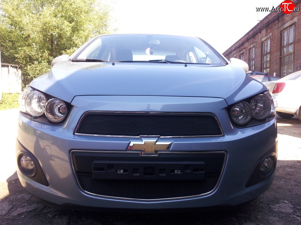 1 469 р. Нижняя сетка на бампер Russtal (черная)  Chevrolet Aveo  T300 (2011-2015) седан, хэтчбек  с доставкой в г. Кемерово