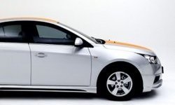 3 999 р. Накладка на передний бампер Extrime Chevrolet Cruze J305 хэтчбек дорестайлинг (2009-2012) (Неокрашенная)  с доставкой в г. Кемерово. Увеличить фотографию 2
