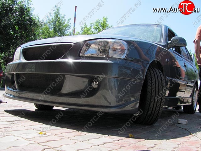 6 099 р. Передний бампер Racer Hyundai Accent 2 LC седан дорестайлинг (ТагАЗ) (1999-2012) (Неокрашенный)  с доставкой в г. Кемерово