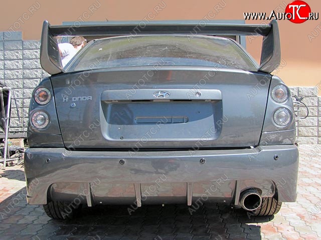 6 099 р. Задний бампер RACER DESIGN Hyundai Accent 2 LC седан дорестайлинг (ТагАЗ) (1999-2012) (Неокрашенный)  с доставкой в г. Кемерово