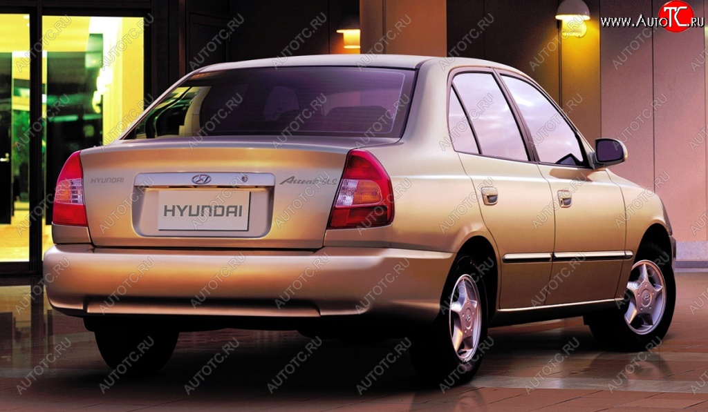 4 899 р. Задний бампер Стандартный Hyundai Accent 2 LC седан дорестайлинг (ТагАЗ) (1999-2012) (Неокрашенный)  с доставкой в г. Кемерово