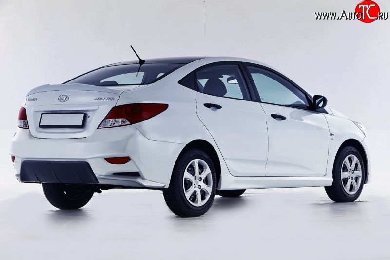 13 499 р. Задний бампер Sport  Hyundai Solaris  RBr (2010-2014) седан дорестайлинг (Неокрашенный)  с доставкой в г. Кемерово