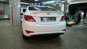 3 899 р. Накладка на задний бампер АвтоКрат  Hyundai Solaris  RBr (2014-2017) седан рестайлинг (Неокрашенная)  с доставкой в г. Кемерово. Увеличить фотографию 3