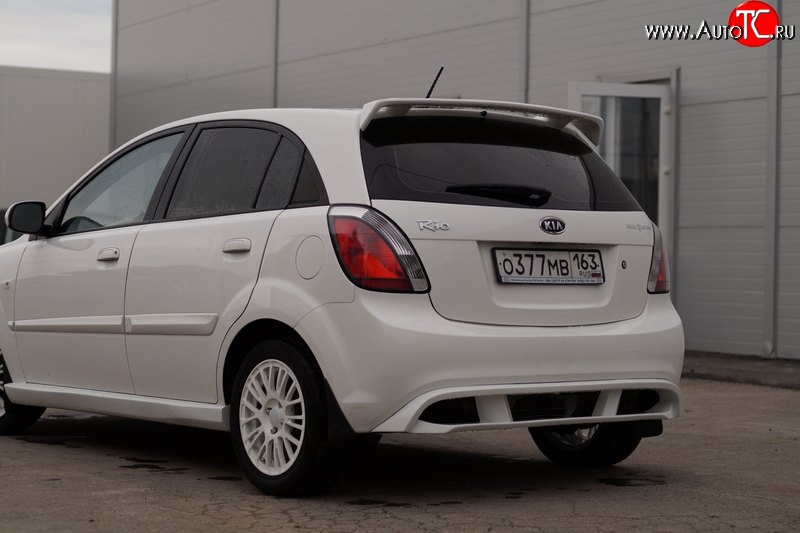 5 899 р. Накладка заднего бампера Vita Dm  KIA Rio ( 2 JB,  4 FB) (2005-2025) дорестайлинг, хэтчбэк 5 дв., рестайлинг, хэтчбэк 5 дв., рестайлинг седан (Неокрашенная)  с доставкой в г. Кемерово