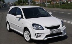 10 999 р. Передний бампер Vita Dm  KIA Rio ( 2 JB,  4 FB) (2005-2025) дорестайлинг седан, дорестайлинг, хэтчбэк 5 дв., рестайлинг, хэтчбэк 5 дв., рестайлинг седан (Без сетки, Неокрашенный)  с доставкой в г. Кемерово. Увеличить фотографию 5