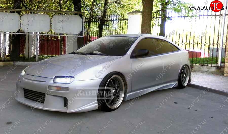 27 899 р. Передний бампер Next Mazda 323 BA дорестайлинг седан (1994-1996)  с доставкой в г. Кемерово