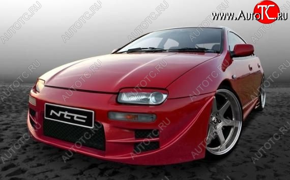 25 699 р. Передний бампер NTC Mazda 323 BA дорестайлинг седан (1994-1996)  с доставкой в г. Кемерово
