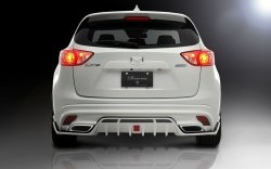 23 749 р. Накладка на задний бампер ROWEN Mazda CX-5 KE дорестайлинг (2011-2014) (Неокрашенная)  с доставкой в г. Кемерово. Увеличить фотографию 7