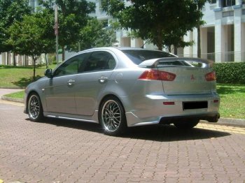 7 499 р. Накладка заднего бампера Zodiak (под одинарный выхлоп) MV-Tuning Mitsubishi Lancer 10 CY седан дорестайлинг (2007-2010) (Неокрашенная)  с доставкой в г. Кемерово. Увеличить фотографию 3