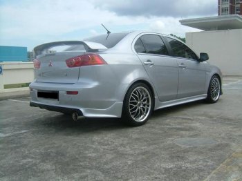 7 499 р. Накладка заднего бампера Zodiak (под одинарный выхлоп) MV-Tuning Mitsubishi Lancer 10 CY седан дорестайлинг (2007-2010) (Неокрашенная)  с доставкой в г. Кемерово. Увеличить фотографию 4