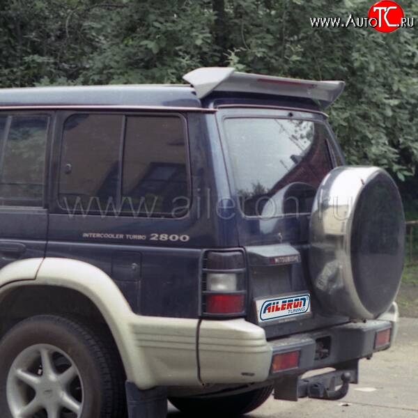 3 899 р. Спойлер Aileron  Mitsubishi Pajero ( 2 V30/V40 5 дв.,  2 V20,  2 V30/V40) (1991-1999) дорестайлинг, рестайлинг (Неокрашенный)  с доставкой в г. Кемерово