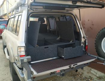 26 999 р. Органайзер в багажник для Toyota Land Cruiser 80 (2 выдвижных ящика+спальник) РФ 080-003  с доставкой в г. Кемерово. Увеличить фотографию 1