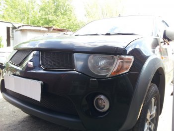 3 169 р. Защитная сетка в бампер (низ, ячейка 3х7 мм) Alfeco Стандарт Mitsubishi L200 4  дорестайлинг (2006-2014) (Чёрная)  с доставкой в г. Кемерово. Увеличить фотографию 2