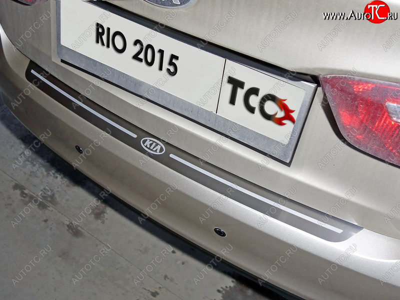 2 999 р. Накладка на задний бампер, ТСС Тюнинг  KIA Rio  3 QB (2015-2017) рестайлинг седан, рестайлингхэтчбек5дв. (лист шлифованный надпись RIO)  с доставкой в г. Кемерово