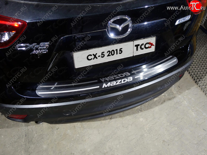 3 999 р. Накладка на задний бампер, ТСС Тюнинг  Mazda CX-5  KE (2015-2017) рестайлинг (лист шлифованный надпись MAZDA)  с доставкой в г. Кемерово