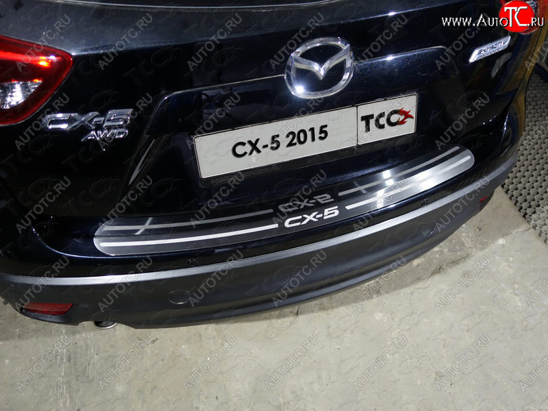 3 999 р. Накладка на задний бампер, ТСС Тюнинг  Mazda CX-5  KE (2015-2017) рестайлинг (лист шлифованный надпись CX-5)  с доставкой в г. Кемерово