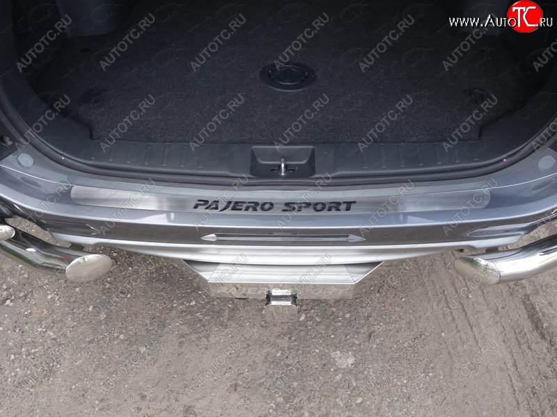 2 999 р. Накладка на задний бампер, ТСС Тюнинг  Mitsubishi Pajero Sport  QE (2015-2021) дорестайлинг (лист шлифованный надпись Pajero Sport)  с доставкой в г. Кемерово