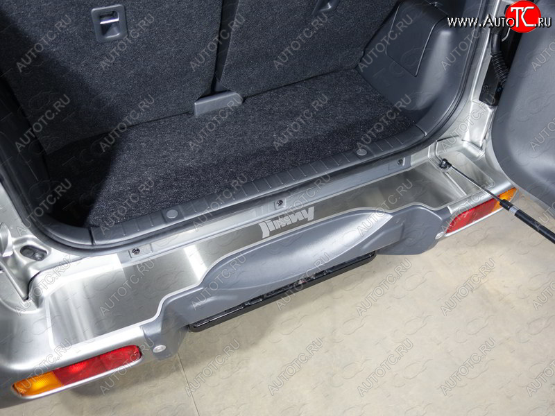 4 399 р. Накладка на задний бампер, ТСС Тюнинг  Suzuki Jimny  JB23/JB43 (2012-2018) 2-ой рестайлинг (лист шлифованный надпись Jimny)  с доставкой в г. Кемерово