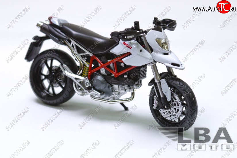 1 599 р. Модель мотоцикла Ducati Hypermotard 10 Белого цвета масштаб 112  пм-00000858  с доставкой в г. Кемерово