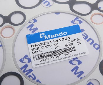 152 р. Прокладка головки блока HYUNDAI HD65,72,County дв.D4AF t=1.40мм (M) MANDO MANDO dm2231141201  с доставкой в г. Кемерово. Увеличить фотографию 2