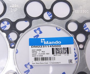 2 049 р. Прокладка головки блока HYUNDAI HD65,72,78,County дв.D4DB,D4DD t=1.40мм (M) MANDO MANDO dm2231145000  с доставкой в г. Кемерово. Увеличить фотографию 2