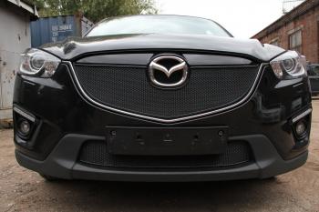 799 р. Зимняя заглушка решетки радиатора (с парктроником) PREMIUM Стрелка11 Mazda CX-5 KE дорестайлинг (2011-2014) (черная)  с доставкой в г. Кемерово. Увеличить фотографию 2
