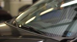 2 679 р. Обтекатель дворников на автомобиль Petroil Tuning  Renault Duster  HS (2010-2015) дорестайлинг (Текстурная поверхность)  с доставкой в г. Кемерово. Увеличить фотографию 2