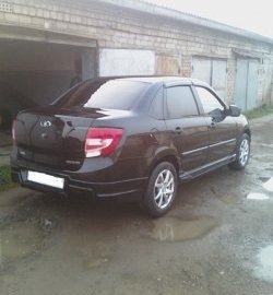 2 749 р. Накладка Sport-Style на задний бампер  Лада Гранта  2190 (2011-2017) седан дорестайлинг (Неокрашенная)  с доставкой в г. Кемерово. Увеличить фотографию 2