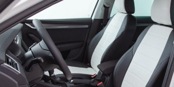 6 999 р. Чехлы Seintex (экокожа, 40/60, Airbag)  Лада Веста ( 2180,  SW 2181) - Веста Кросс ( 2181,  2180) (черный/белый)  с доставкой в г. Кемерово. Увеличить фотографию 2